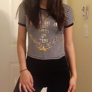 B&W striped cropped shirt with gold anchor design!